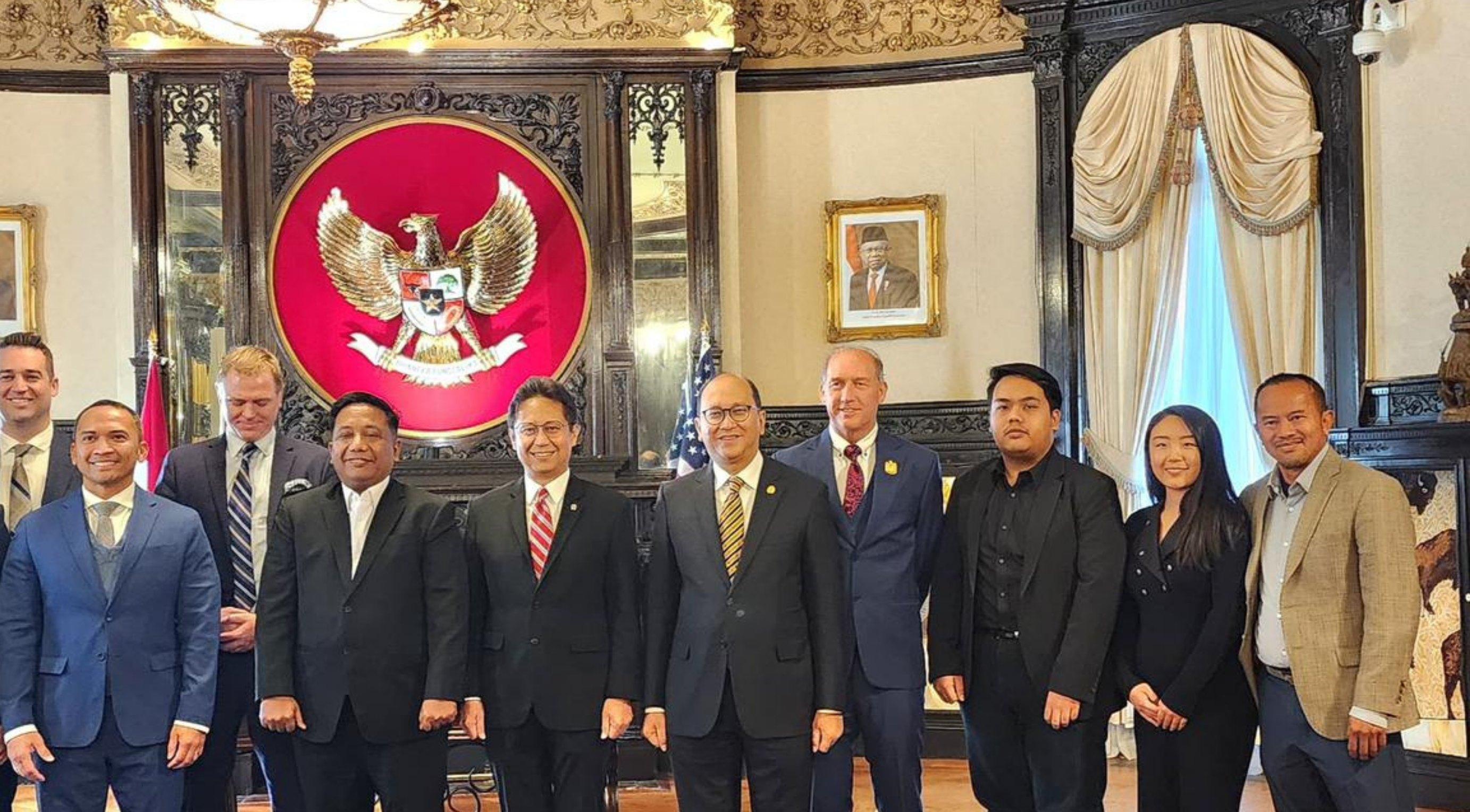 A Tynergy delegation stands with Indonesian officials in Washington, DC